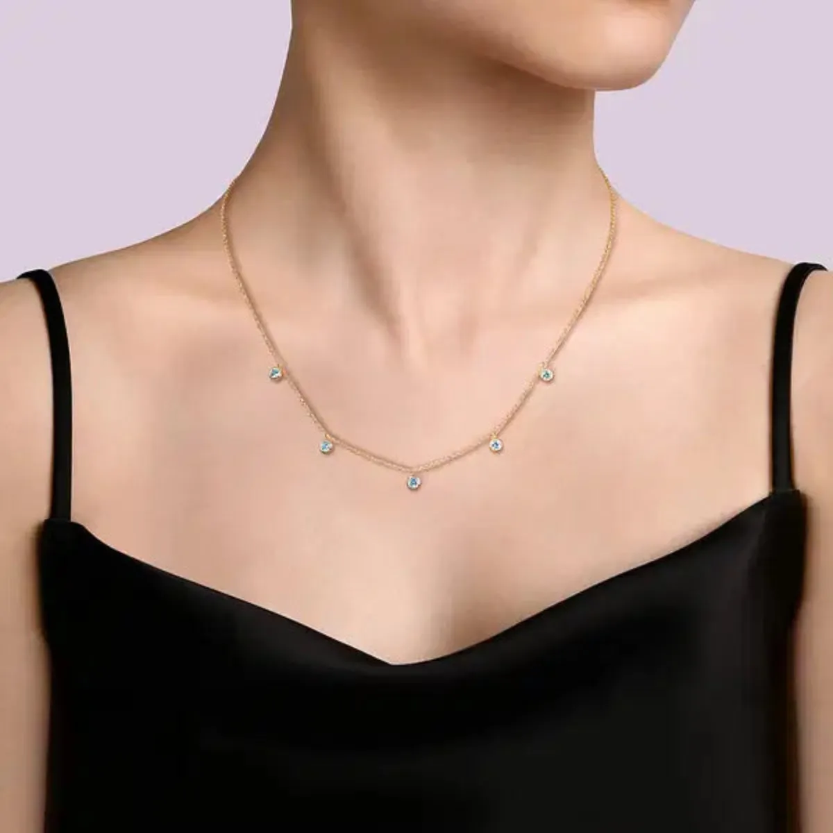 14K Y Gold  0.67ctw Blue Topaz Drop Necklace